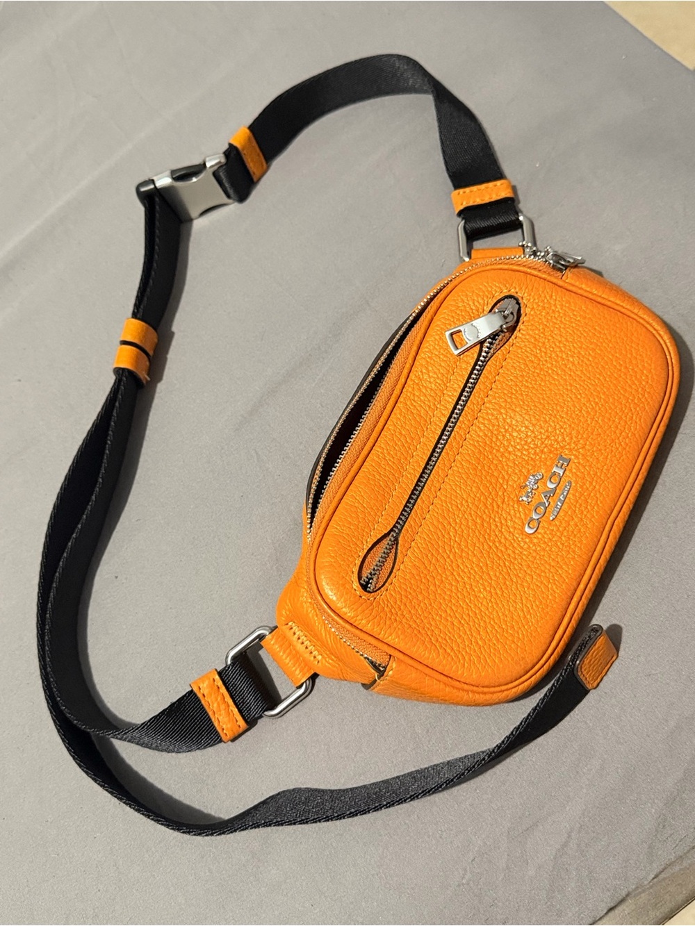 Coach Orange Pebbled Leather Belt Bag with Black Strap Accents